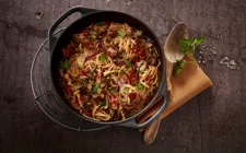 One-pot pasta dish with courgette and spicy sausage