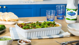 Baked cheese with watercress pesto