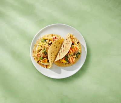 Fish tacos with salmon, mango salsa, and Castello® Tex-Mex Cheese
