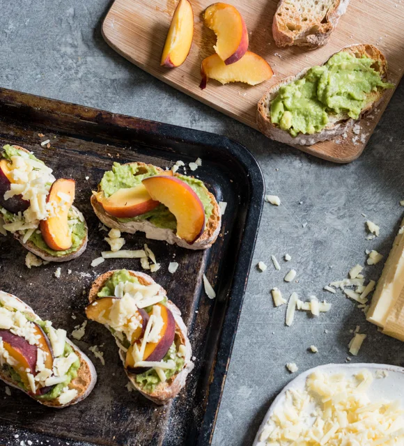 Grilled peach and cheddar avocado crostini