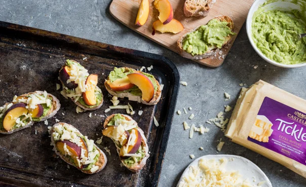 Grilled peach and cheddar avocado crostini