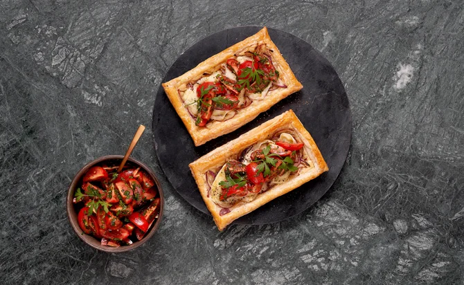 Onion tart with Castello Brie and fresh tomatoes