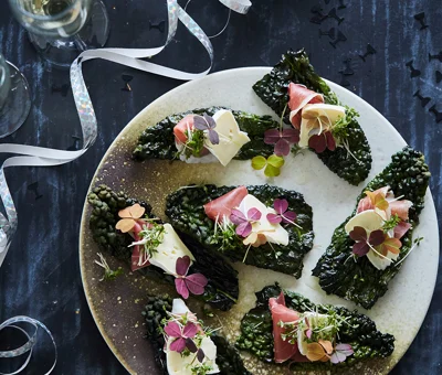 Kale chips with ham, Double Cream Brie and cress