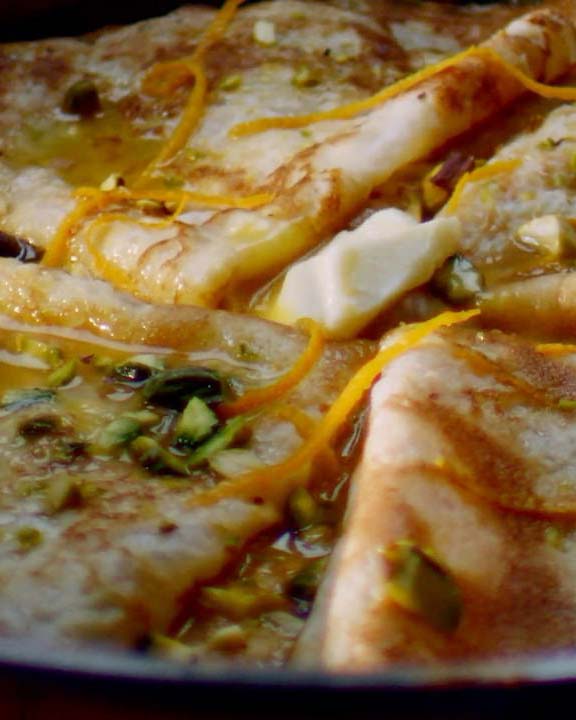 Pancakes with orange & cardamom butter sauce