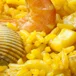 Arroz en costra con berberechos y cañaillas