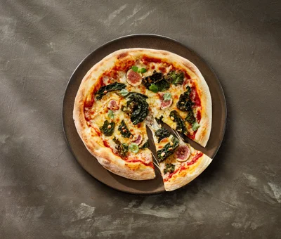 Kale and fig pizza with Castello® cubed mozzarella