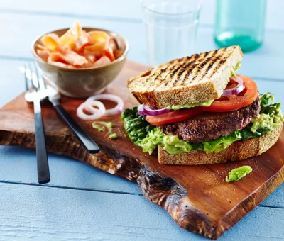 Beef sandwich with avocado cream and carrot salad
