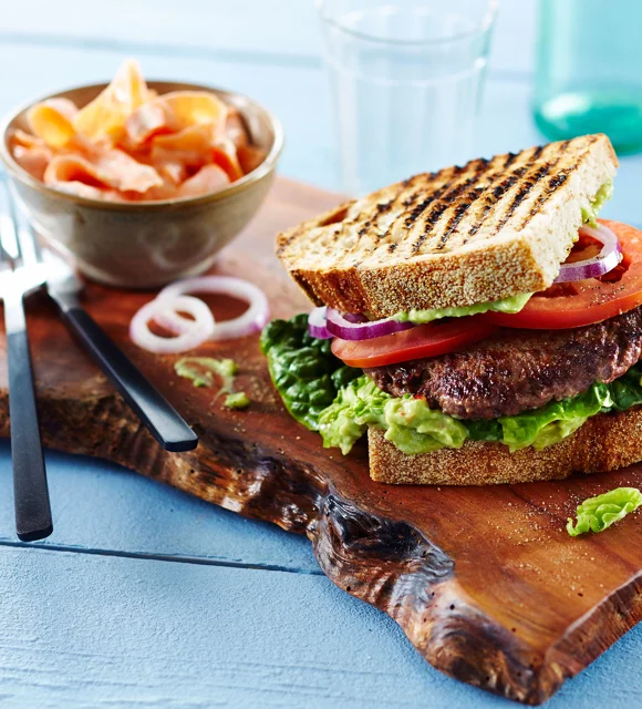 Beef sandwich with avocado cream and carrot salad