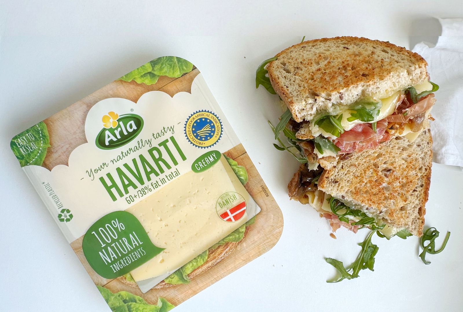 Sándwich gourmet de jamón serrano, Arla Havarti Cremoso y cebolla caramelizada
