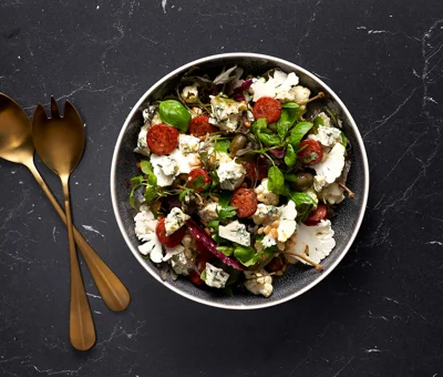 Salad with cauliflower, chorizo and Danish Blue Cheese