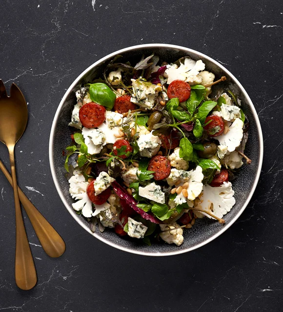 Salad with cauliflower, chorizo and Danish Blue Cheese