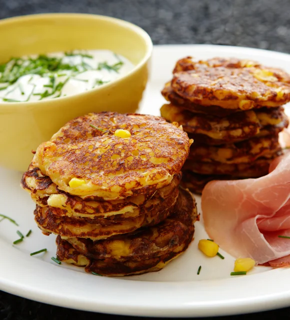Sweetcorn pancakes with ham and chive dressing