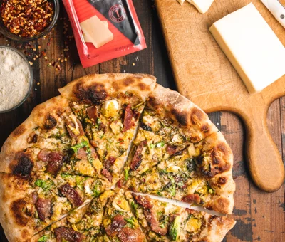 Shredded Brussel Sprouts and Bacon Pizza