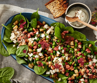 Crunchy Jerusalem artichoke salad with peas and bacon