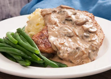 Mashed potatoes with mushroom sauce