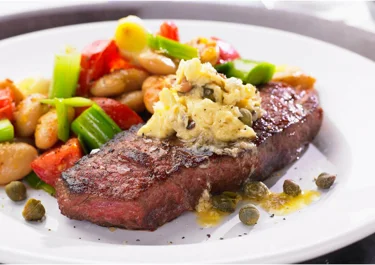 Biff med ansjovissmör och bönor