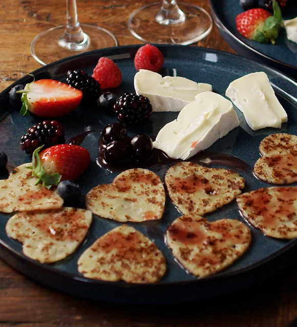 Heart-shaped pancakes with Creamy Brie and berries