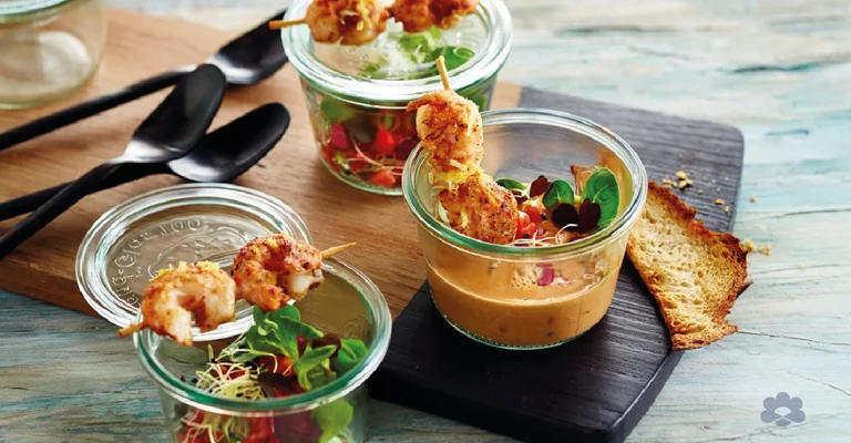 Seafood Soup with shrimp skewers