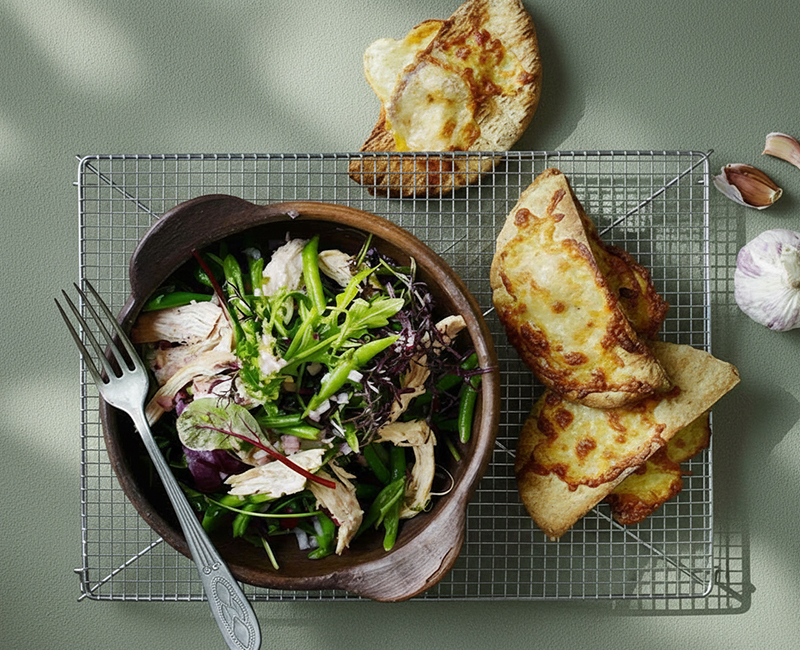 Chicken salad and garlic bread with cheese