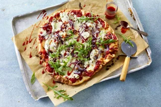 Pizza nordique au saumon frais, roquette et mozzarella cossette