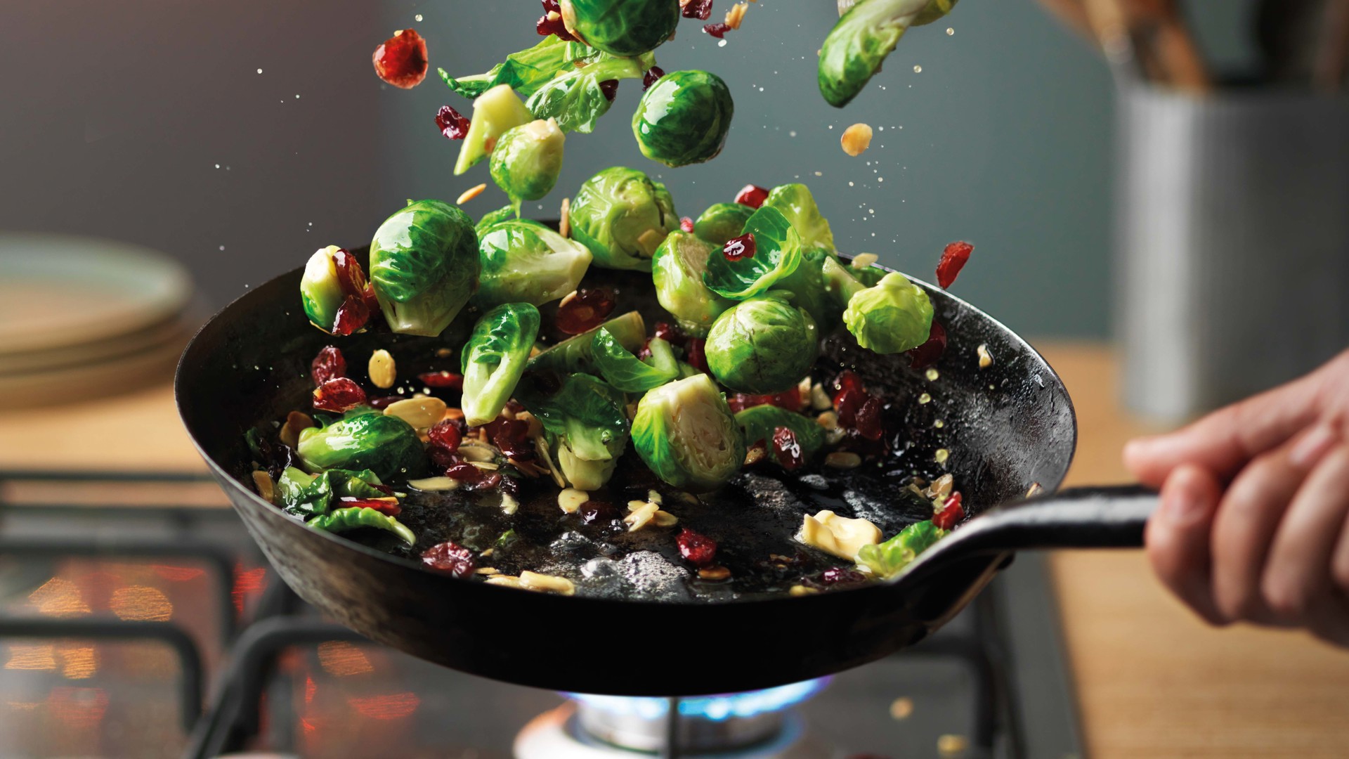 PAN FRIED SPROUTS WITH CRANBERRIES & FLAKED ALMONDS