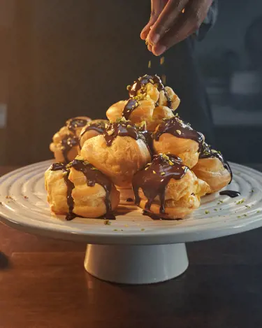 PROFITEROLES DE CHOCOLATE Y NARANJA