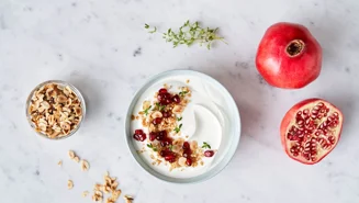 Granola with quinoa and pomegranate topping for skyr