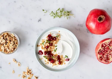 Skyr bowl with granola quinoa and pomegranate