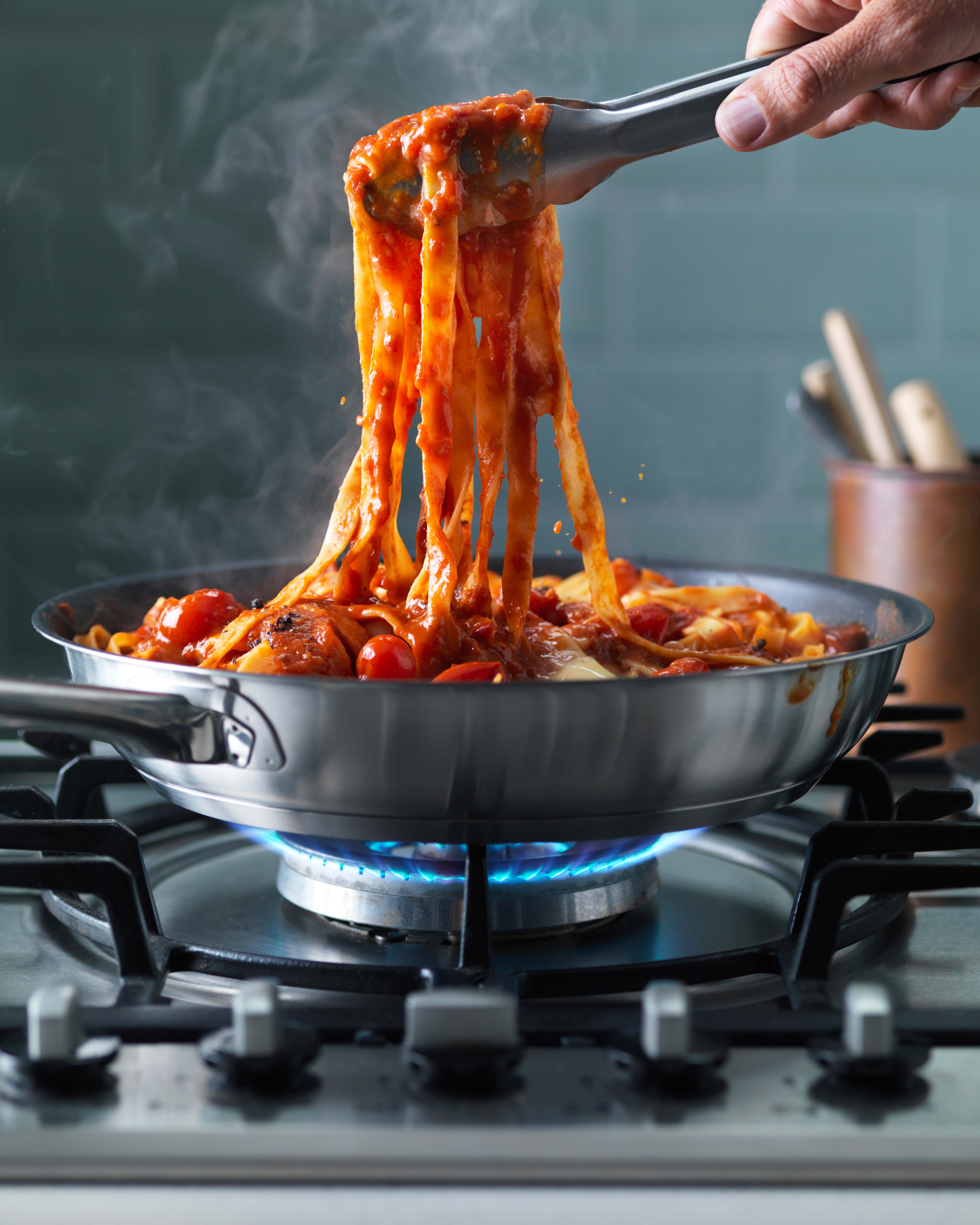 SPAGHETTI WITH TOMATO, LURPAK® BUTTER AND ANCHOVY SAUCE