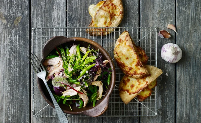 Chicken salad and garlic bread with cheese