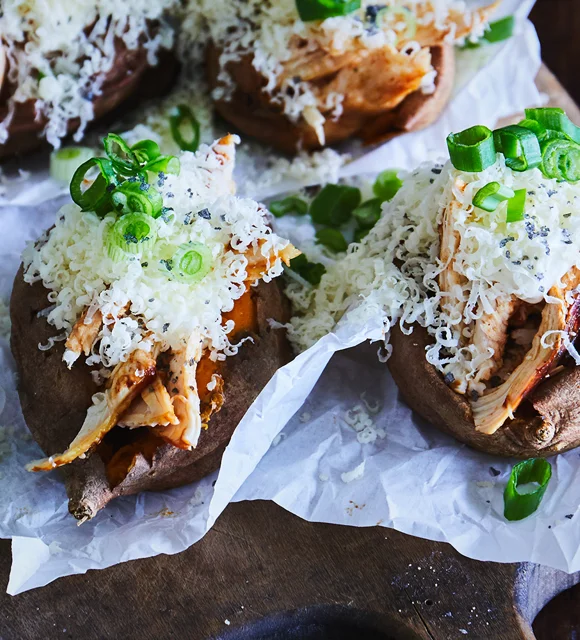 Baked sweet potatoes loaded with grilled chicken and Castello extra mature cheddar