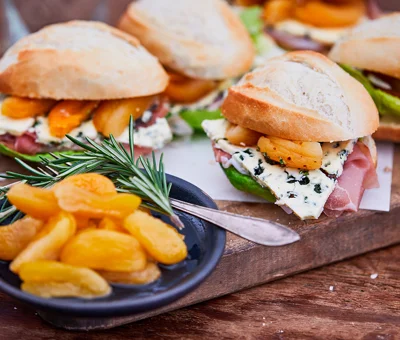 Bocadillos with blue cheese, serrano ham and apricots