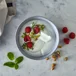 Skyr bowl with pistachio, raspberry and mint