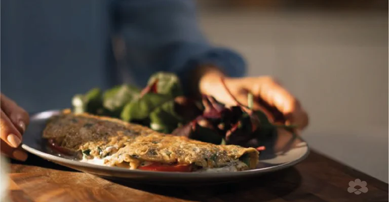 Fresh Herb Omelette with Tomato Slices and Cream Cheese Spread