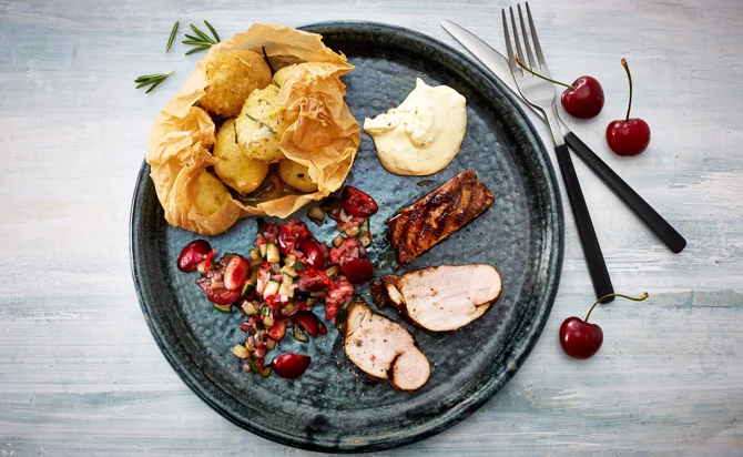 Grilled pork tenderloin with spicy cherry salsa and smoked potatoes