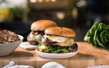 Rib-Eye Burger with fried egg, onions & cheddar