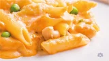 Penne Rigate with Chicken, Sundried Tomato Pesto and Green Peas