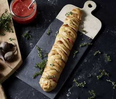 Plaited Pizza Loaf with Castello® Creamy Blue Cheese