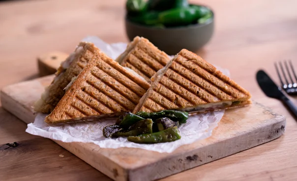 Toasted Serrano ham sandwich with Aged Havarti and Padrón peppers