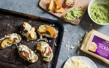Grilled peach and cheddar avocado crostini