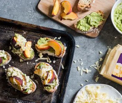 Grilled peach and cheddar avocado crostini