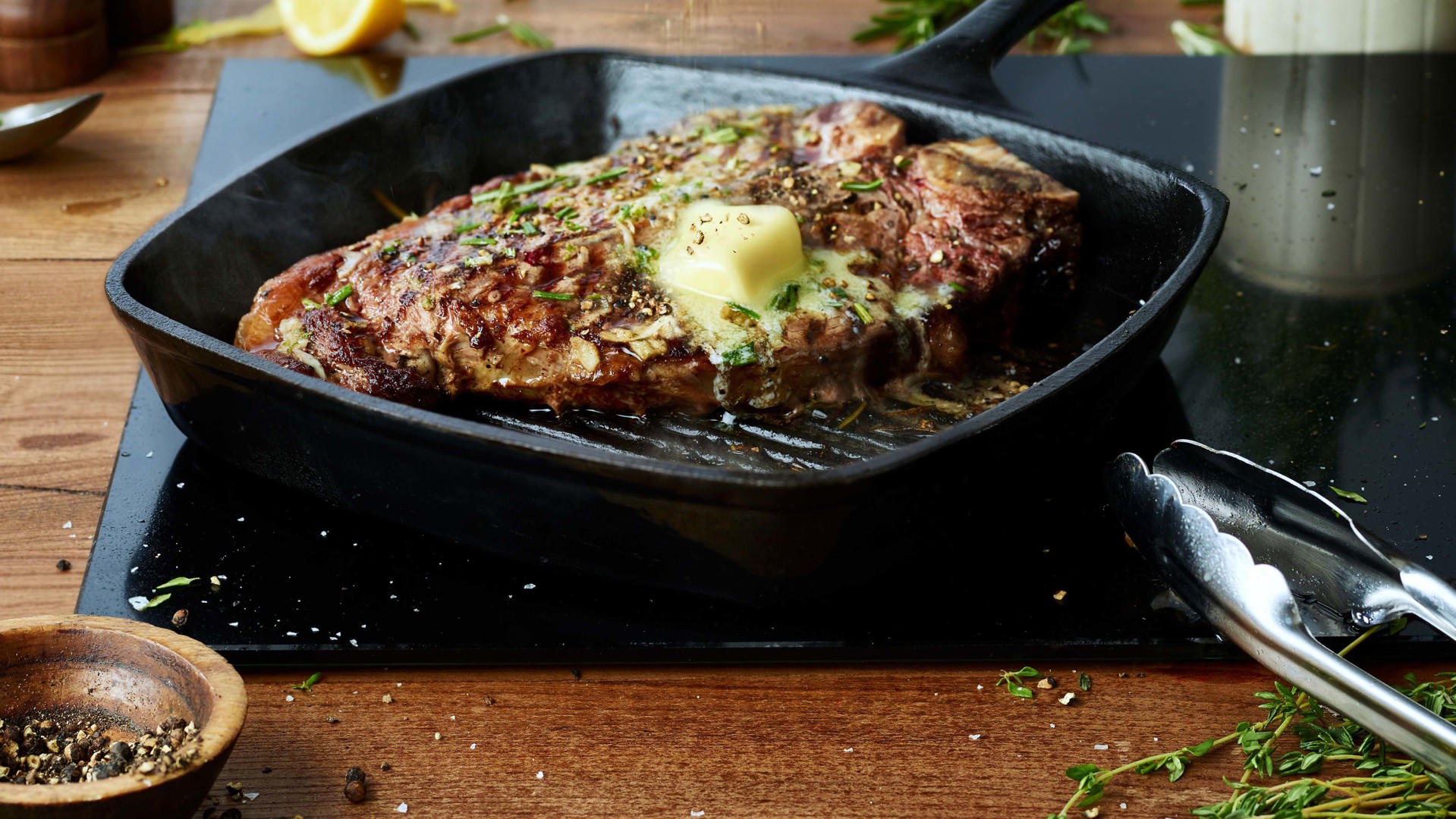 T-bone steak with rosemary, thyme and mint