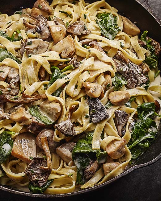 Tagliatelle met wilde champignons en spinazie