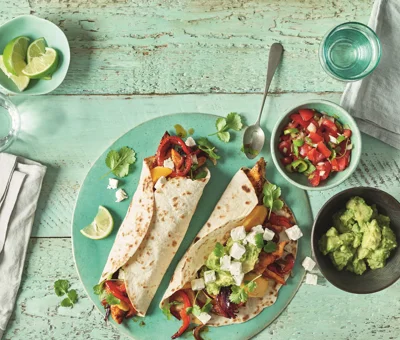 Chicken Fajitas with Castello® Greek Style Cheese Cubes and Smashed Avacado