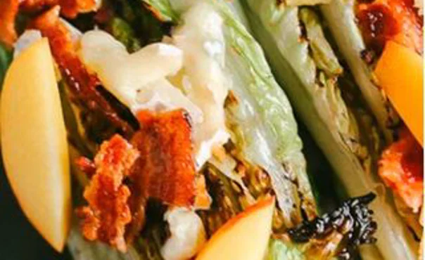 Grilled romaine, peach, bacon and Blue Brie salad