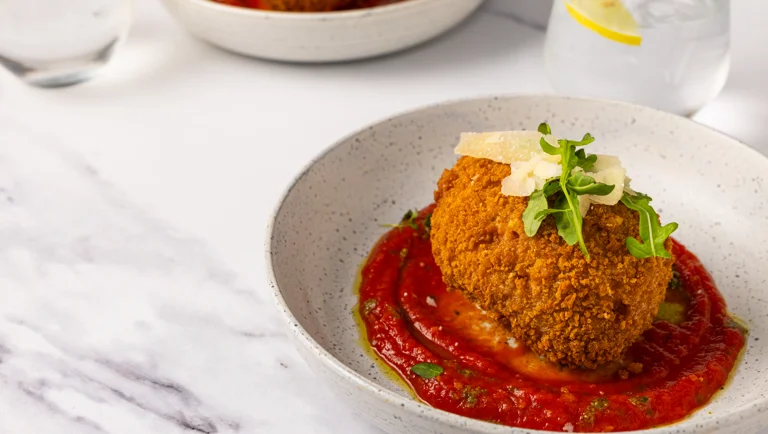 Mozzarella-Stuffed Tomato and Basil Arancini