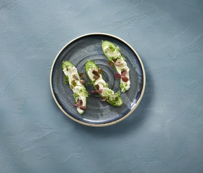 Snack cucumber with Castello® garlic whipped cream cheese