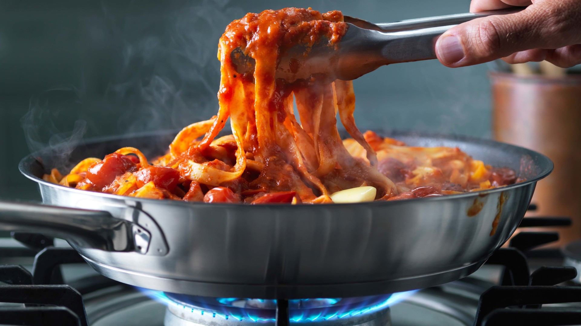 SPAGHETTI WITH TOMATO, LURPAK® BUTTER AND ANCHOVY SAUCE