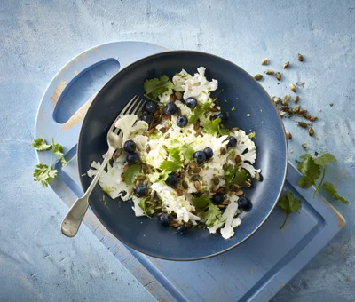 Fresh cauliflower, lime and blueberries