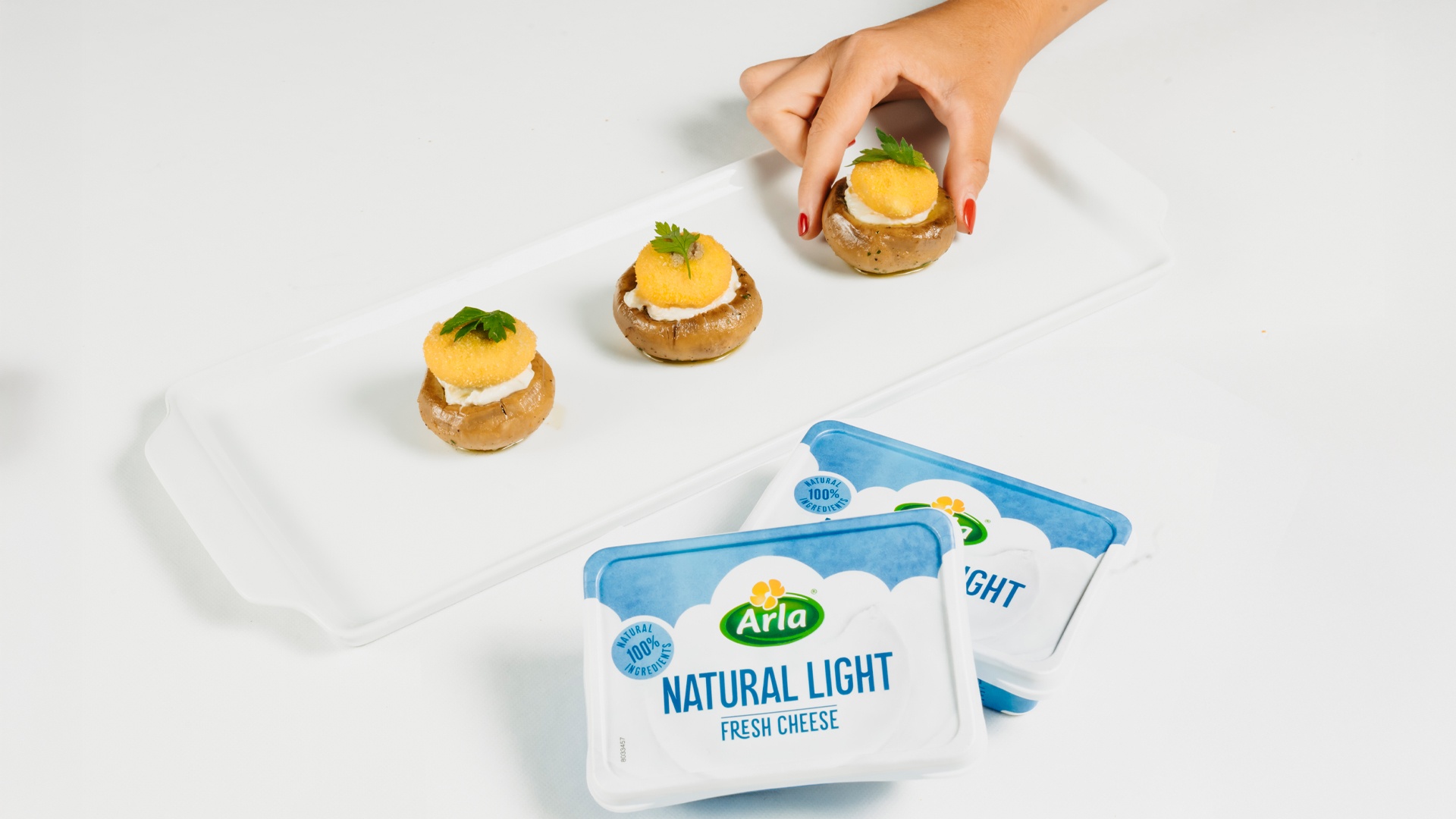 Champiñones con Arla CC Natural y yema de huevo trufada